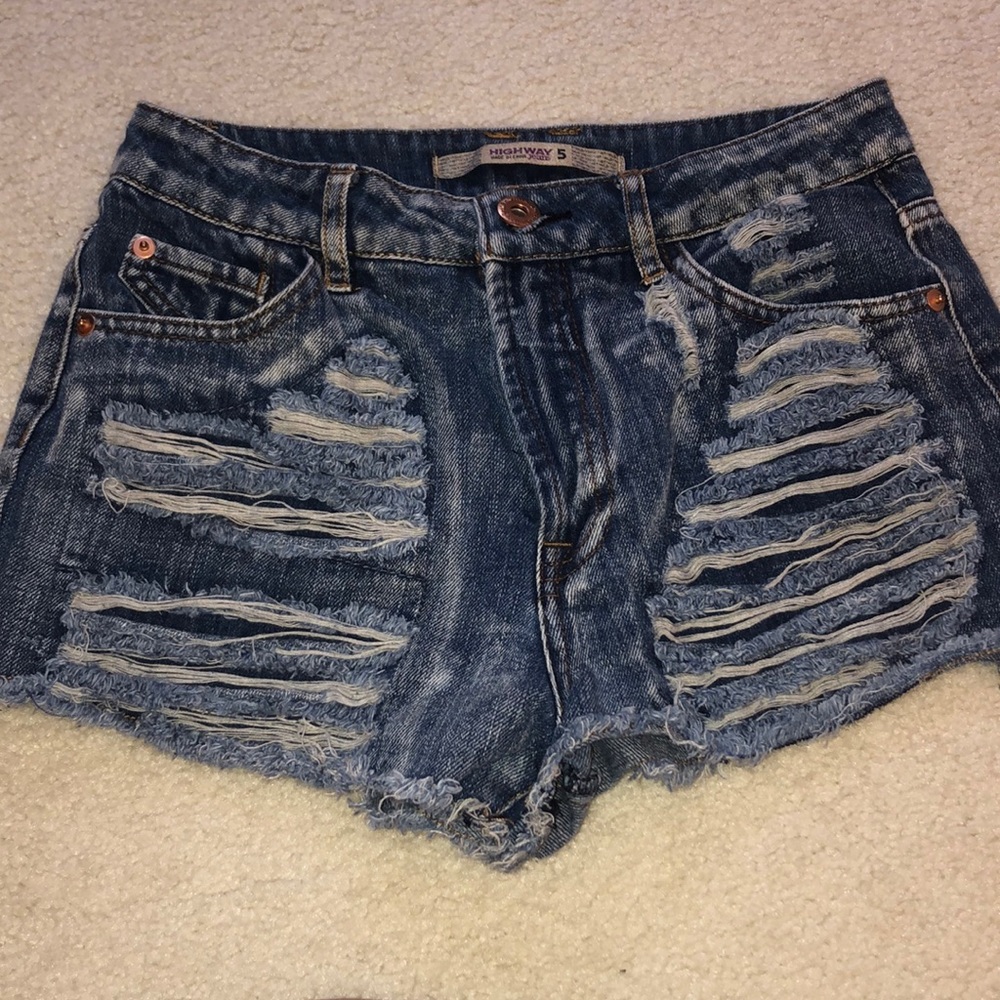 Ripped dark wash jean shorts